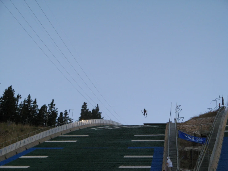 people skiing down the side of a set of steps