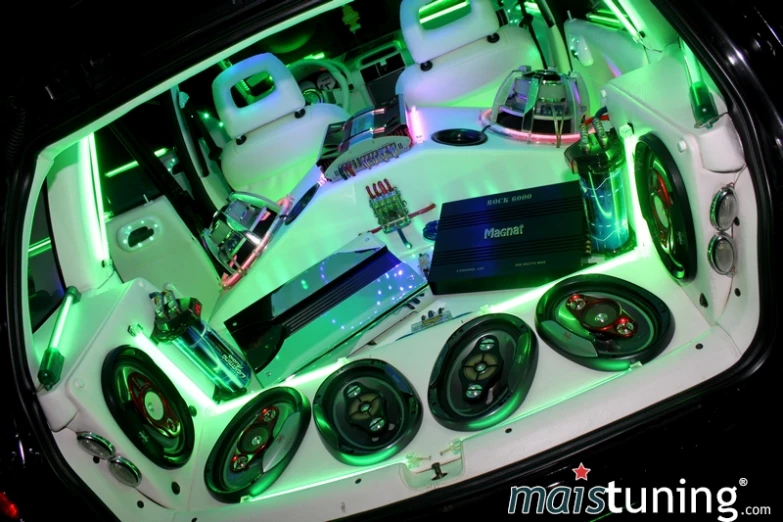 a vehicle with different speakers, lighting, and other electronics
