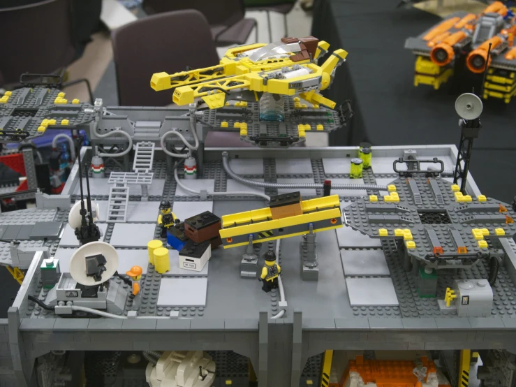 lego robot robotics toy with four machines on display