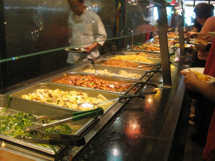 the buffet has many different types of food
