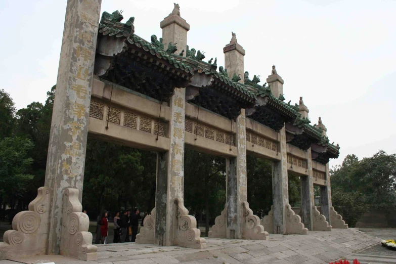 a sculpture of a palace on a cloudy day