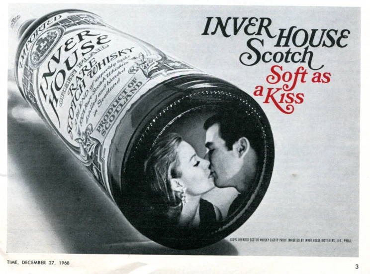 an advertit for scotch whiskey featuring a couple kissing