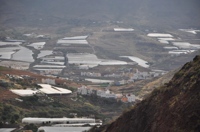 a view of a village from atop of a mountain