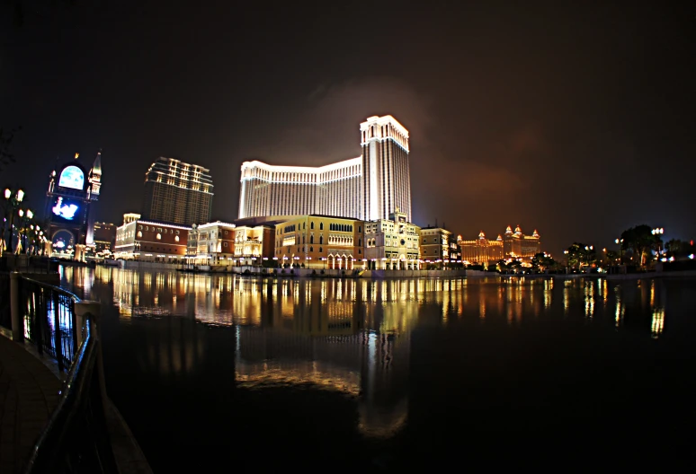 the lights are on on building across the water