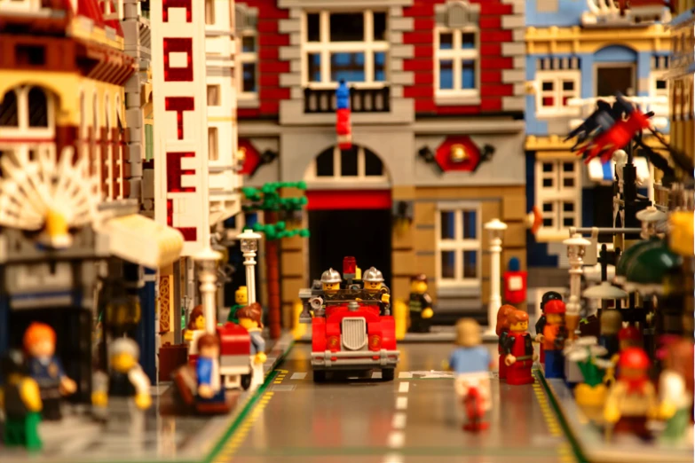 a lego city with people and buildings