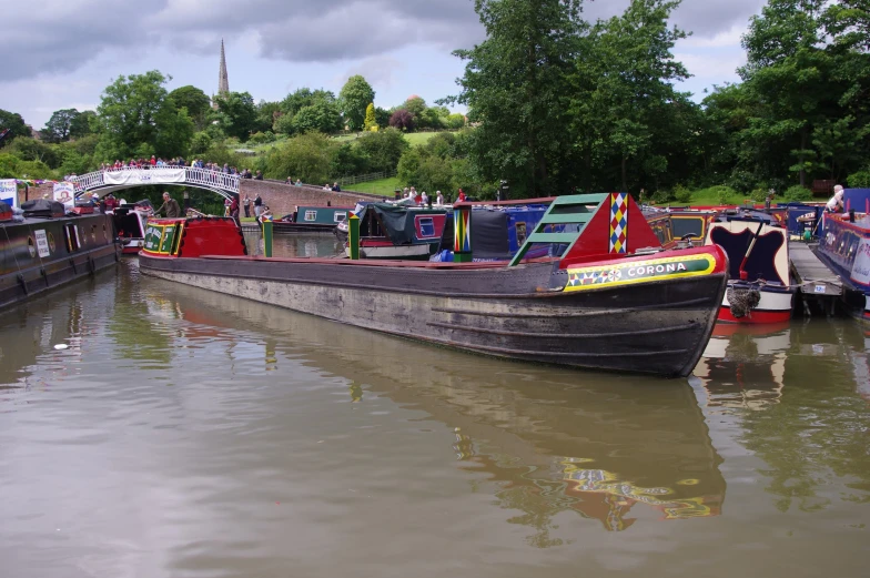 there are several long boats on the water