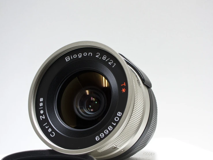 a black lens sitting on top of a table