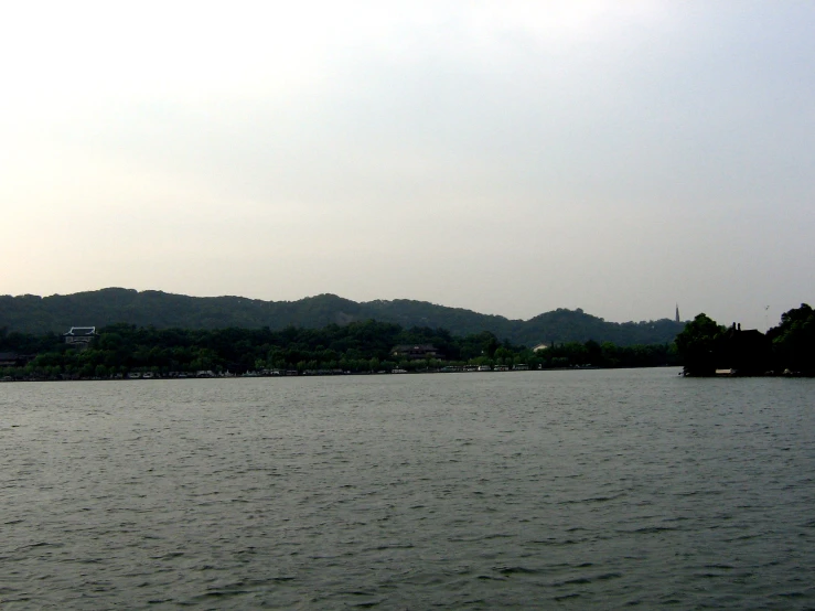 a lone boat out on a calm lake