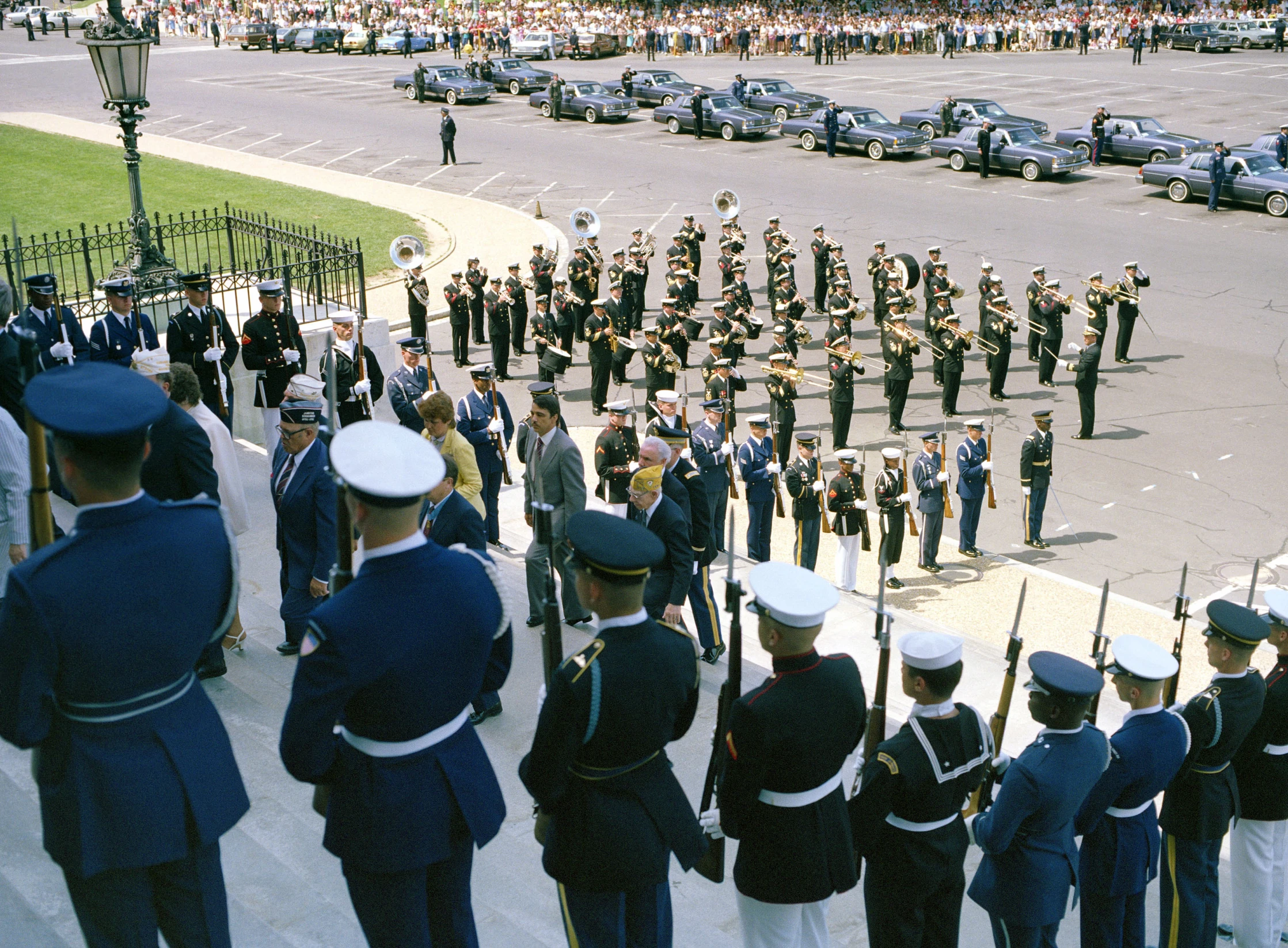 a group of men in blue uniforms standing next to each other