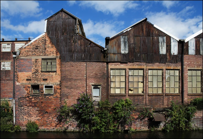 a building that has some old windows and one on the side