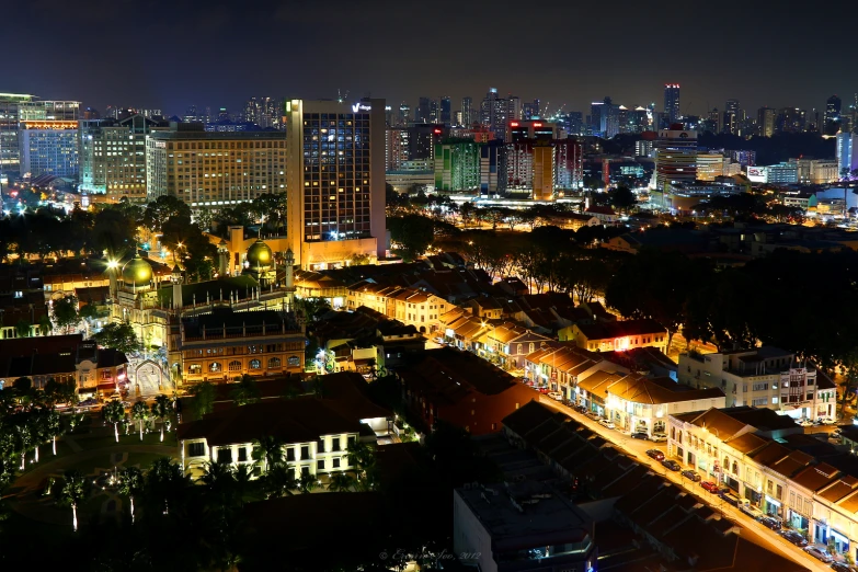 a nighttime cityscape from an elevated point of view