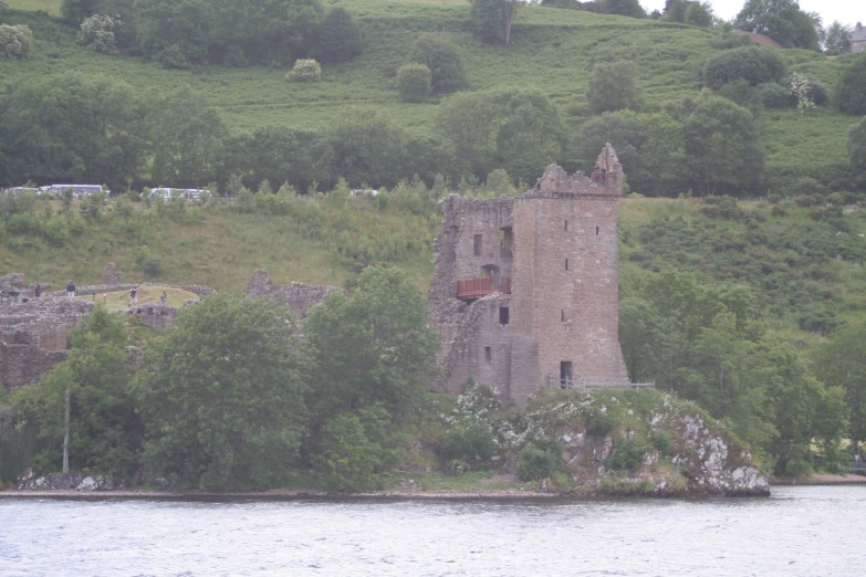 an old stone castle with a small tower