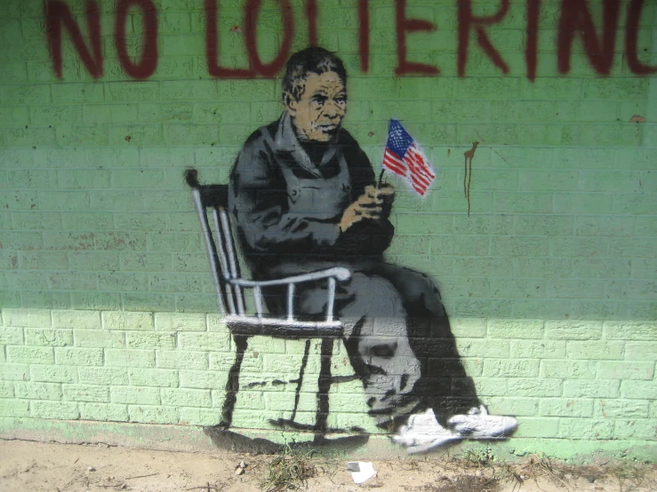 an old painting of a man sitting in a chair on a green wall