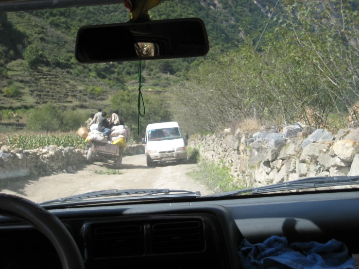 truck, truck and trailer driving on a dirt road