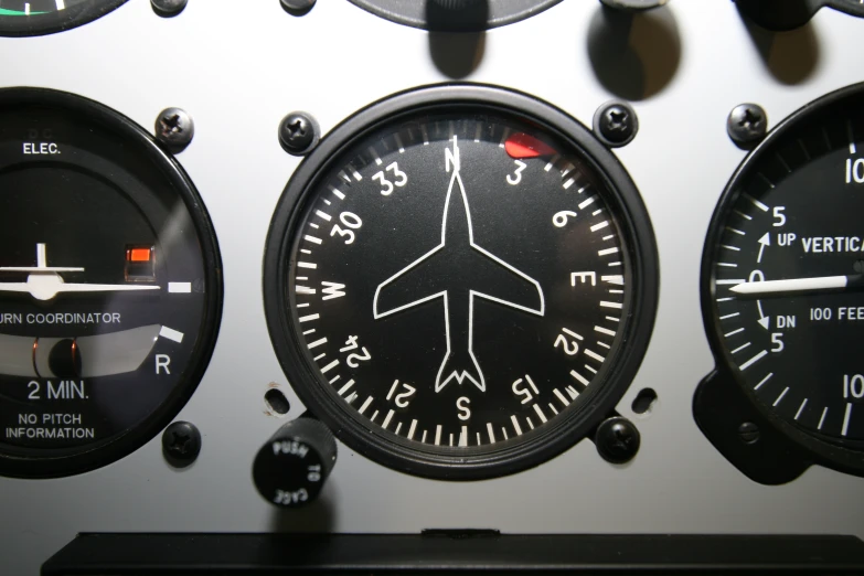 a flight instrument has two large clocks on each side