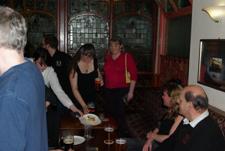 a group of people gathered in a restaurant