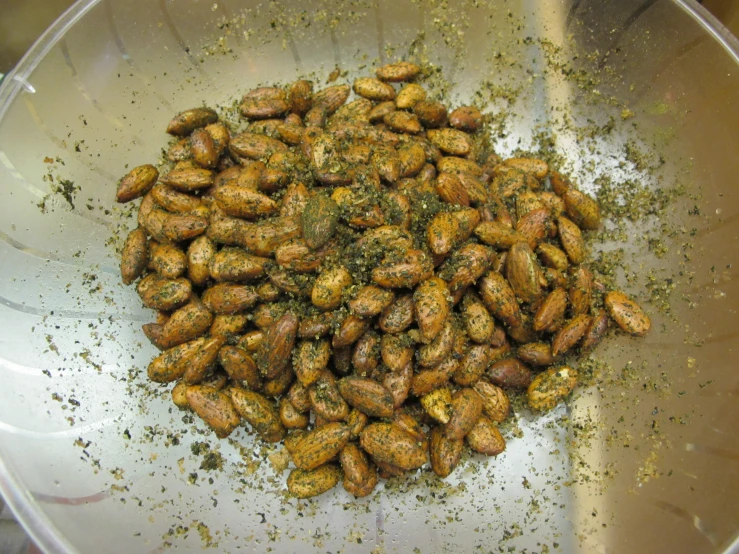 a large bowl filled with different types of nuts