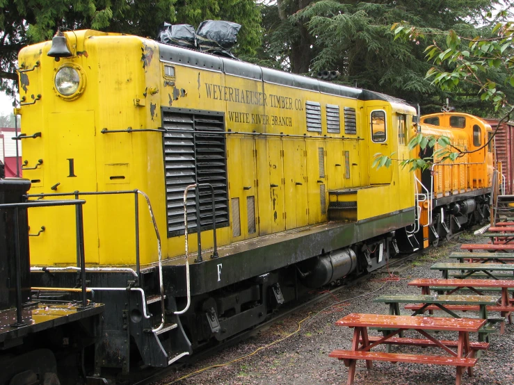 a train engine is parked on the tracks