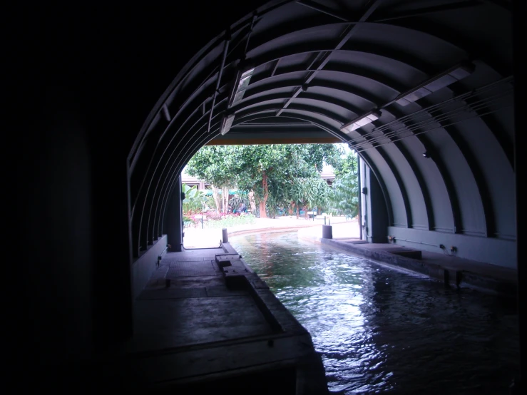 a pool area with a large door leading to another area