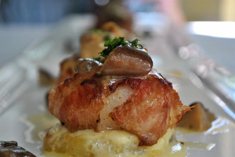 a bunch of food is on a plate with forks