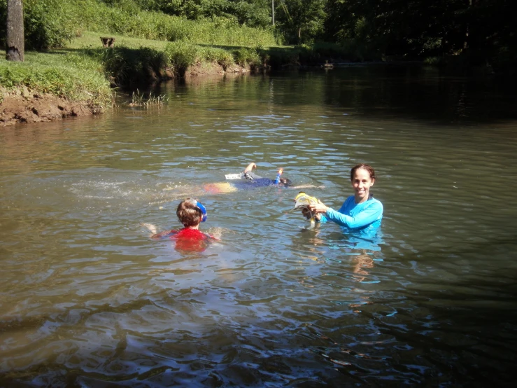 the women and s in the water are getting wet