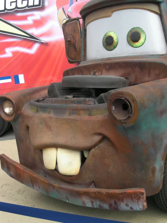 the head and shoulders of the tow truck with eyes