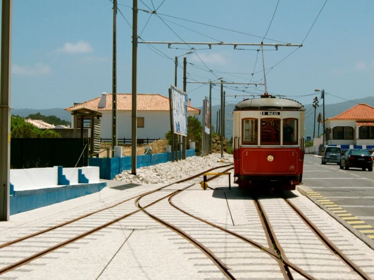 the trolley is driving away from its station