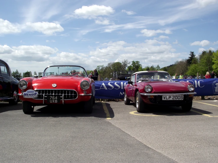 the classic convertible and sports cars have been painted red