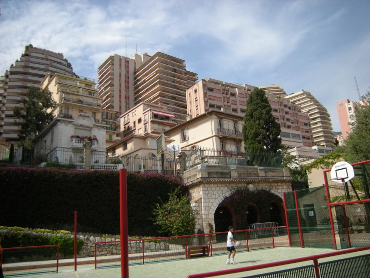 a couple of people playing tennis on the court