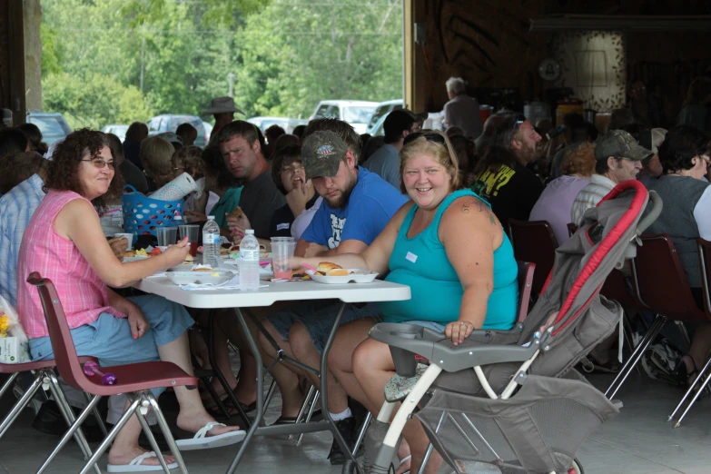 a group of people sitting at a table