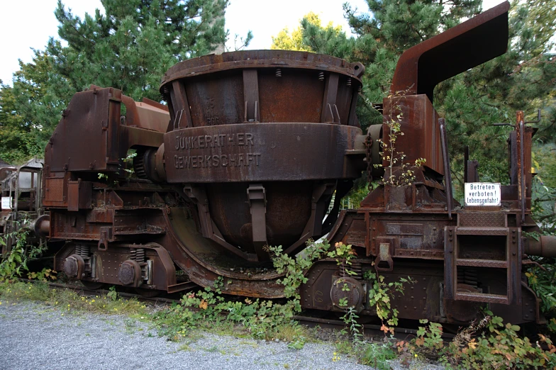 an old train sits still on the railroad tracks