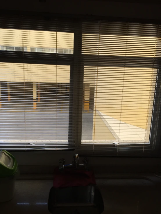 the blinds that are closed over looking the outside