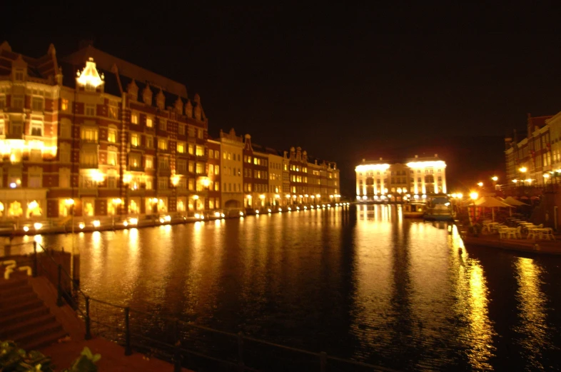 the buildings are all lit up by lanterns