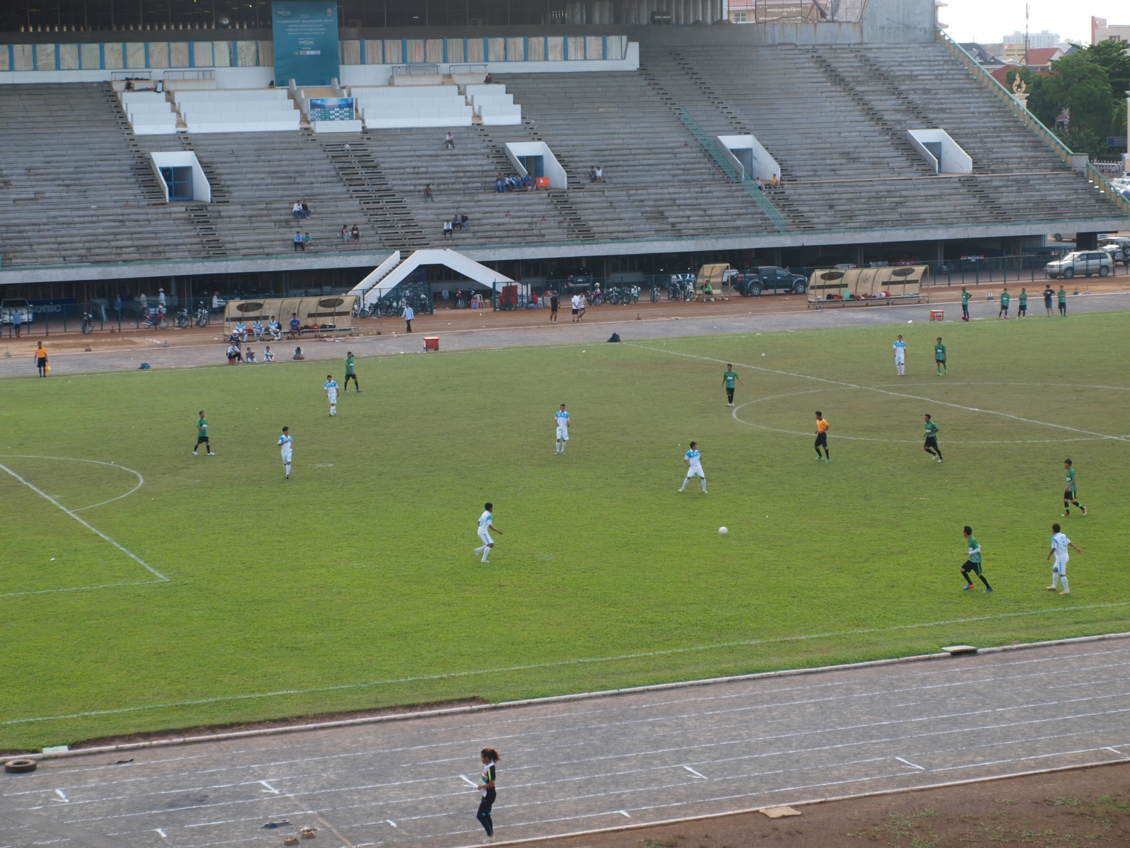 a bunch of soccer players playing soccer on a field