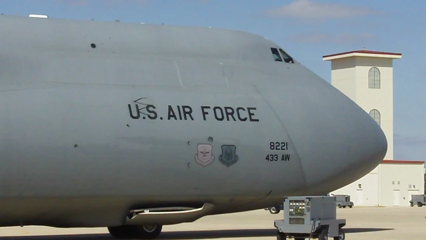 a gray jet that has a us air force patch on it