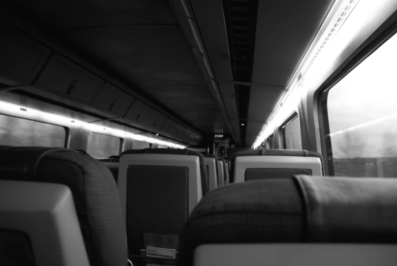 a empty seat sitting on a bus near the window