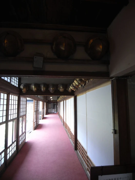 a long corridor that looks out to the outside