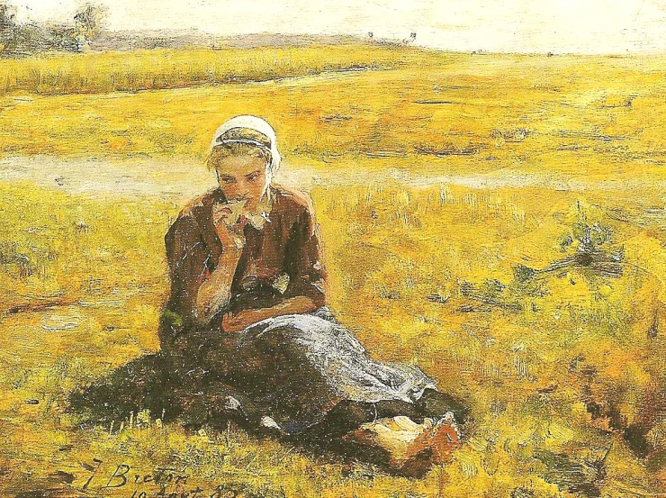 woman in a field with her head bowed, kneeling
