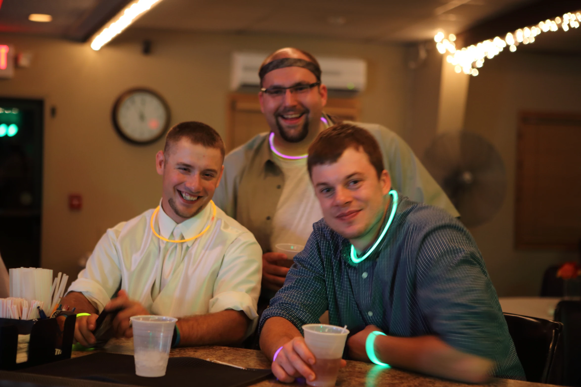 a group of men are posing for a po