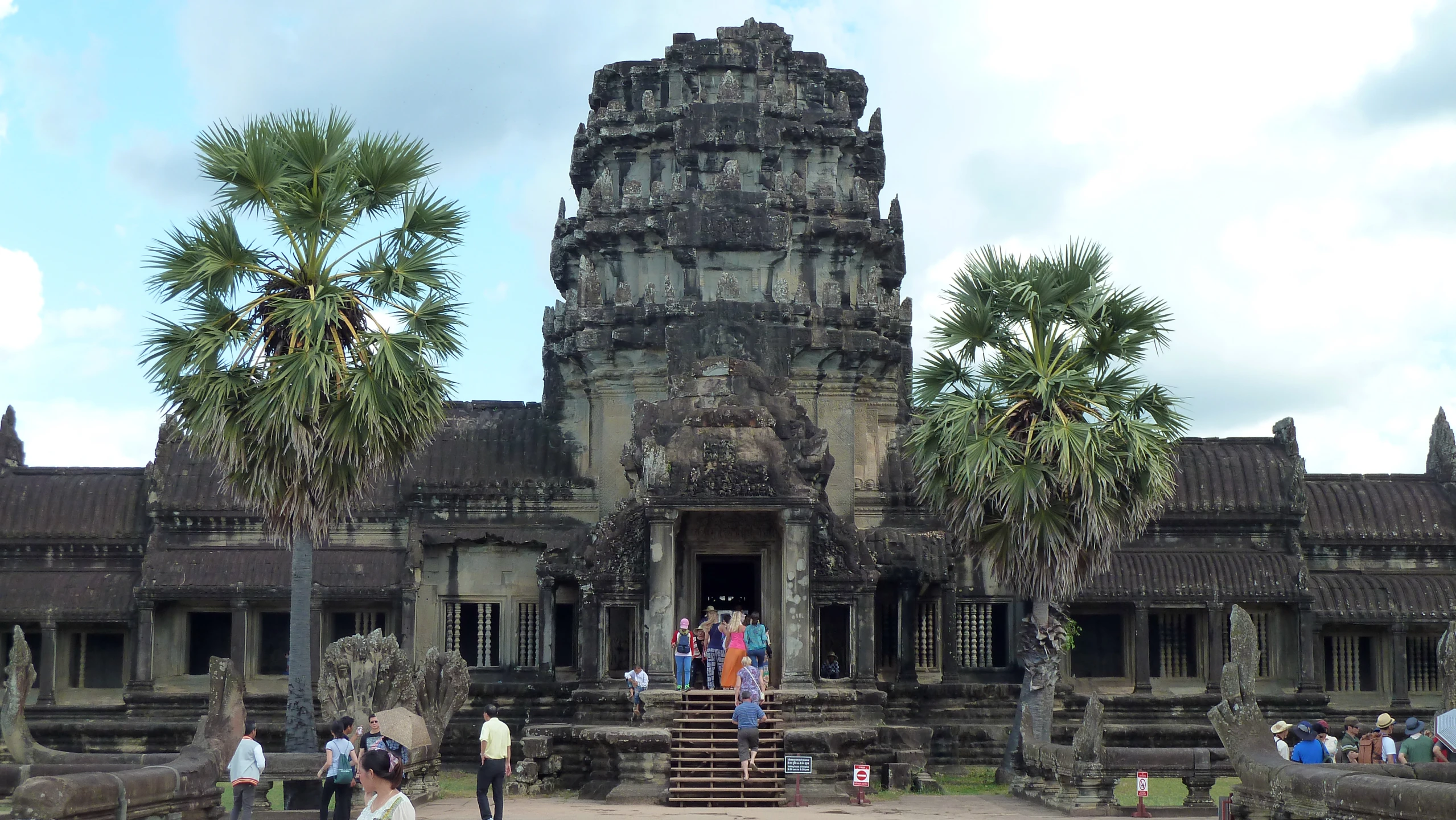 the ruins of an ancient temple are being visited