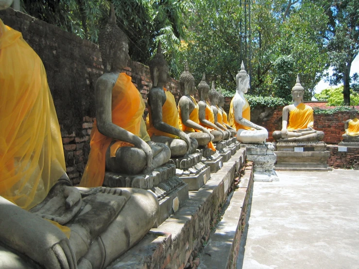 a group of statues sitting next to each other