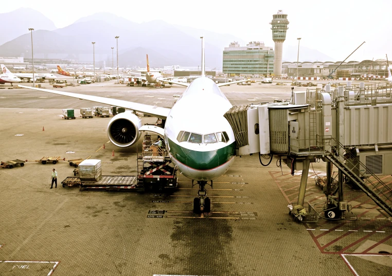 there is an airplane sitting on the runway at the airport