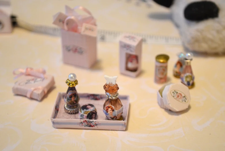 miniature knick - knacks are set up on a table