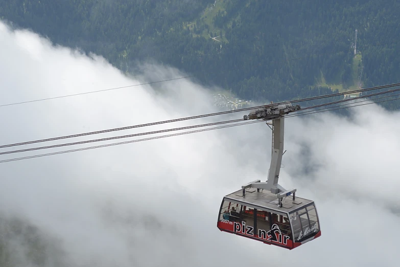 the gondola has two cars and mountain views