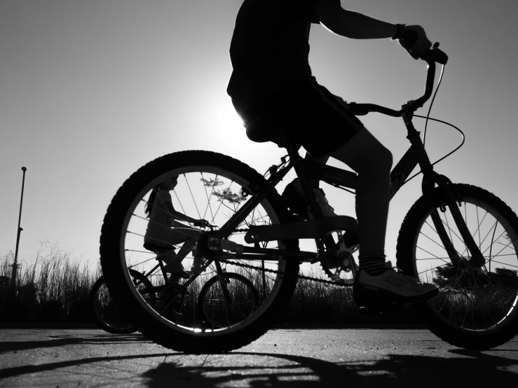 a man is riding his bike on a street