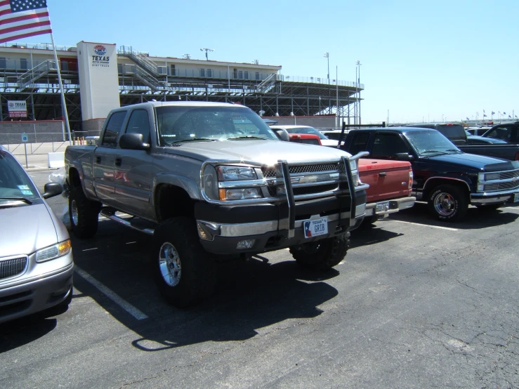several different trucks parked next to each other
