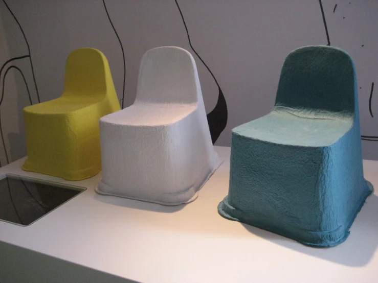 a group of chairs that are on display