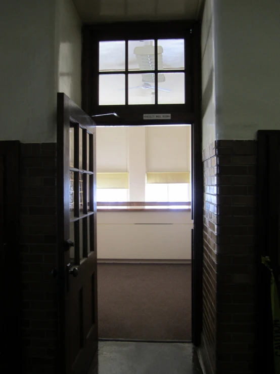 view of the entrance and hallway into a building