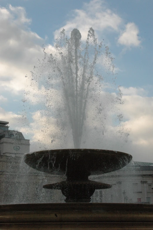 a fountain is shooting water into the air