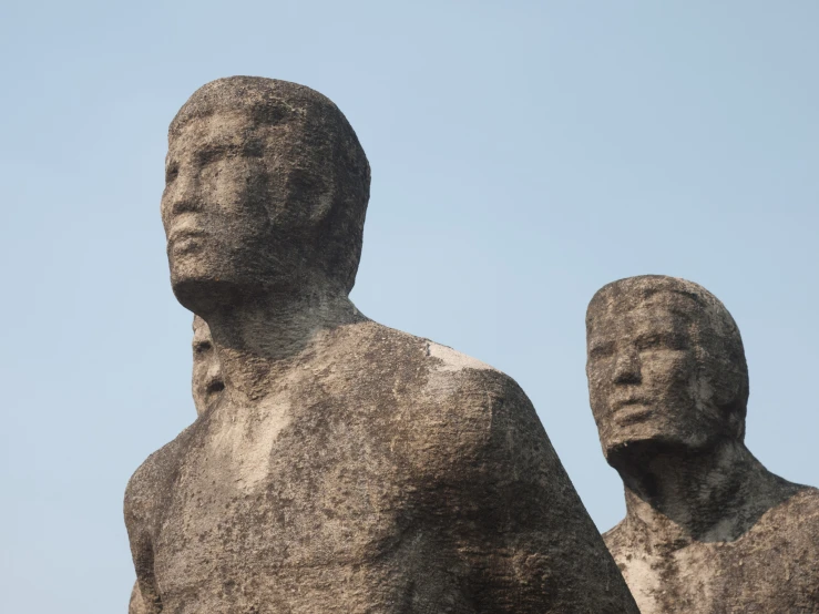 two large sculptures are sitting near each other